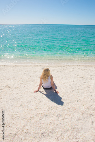 Young woman at white beach paradise Australia