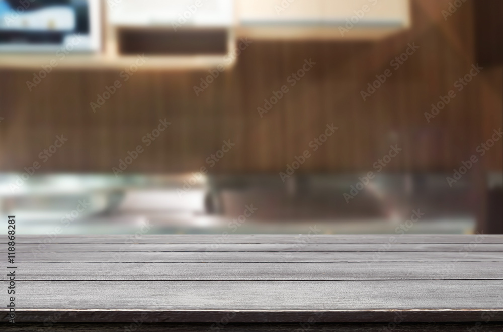Dining table on blurred brown kitchen interior background Dining table on blurred brown kitchen interior background