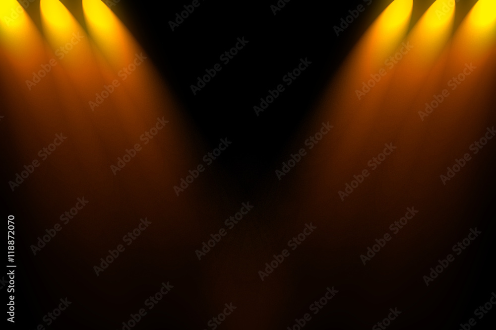 Naklejka premium dark space with gold spotlight background