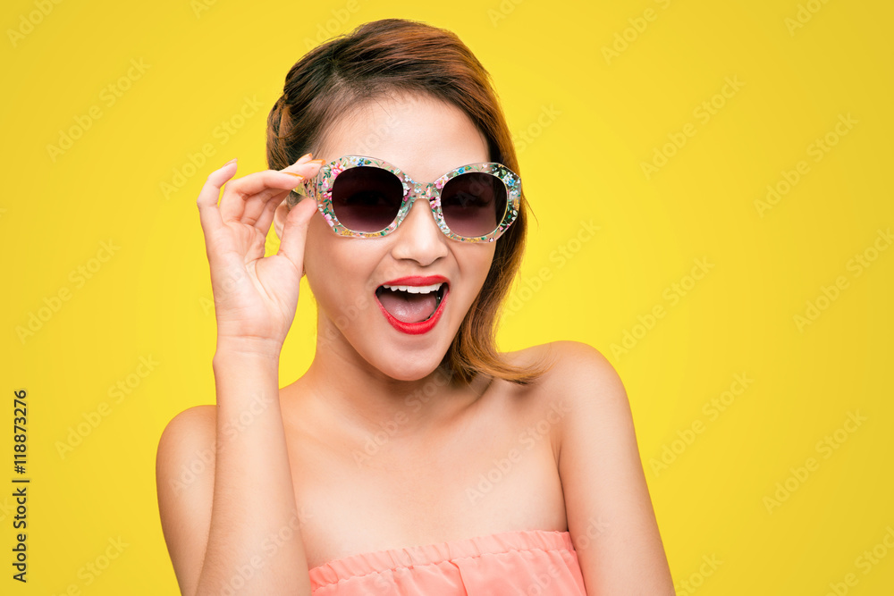 Glamorous asian fashion model posing in vivid colourful clothes Glamorous asian fashion model posing in vivid colourful clothes