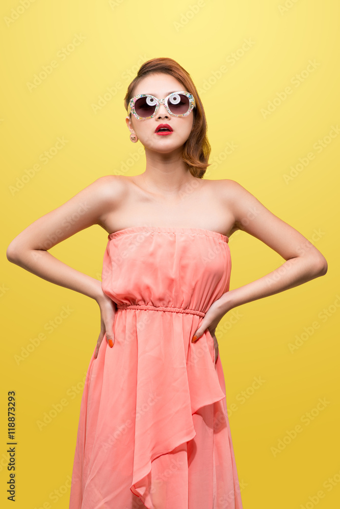 Fashion portrait of asian girl with sunglasses wearing pastel st Fashion portrait of asian girl with sunglasses wearing pastel st