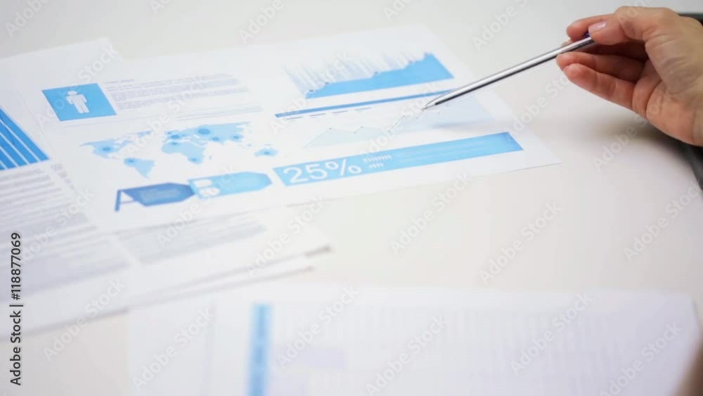 female hands with pen filling papers female hands with pen filling papers