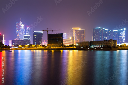 Macao skyline at night © leungchopan
