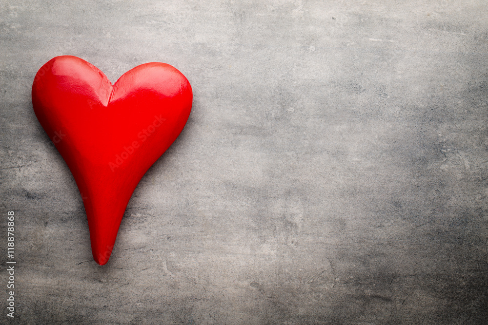 Red heart on the gray metal background. Red heart on the gray metal background.