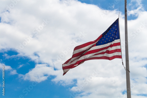 American flag and a cloudy sky