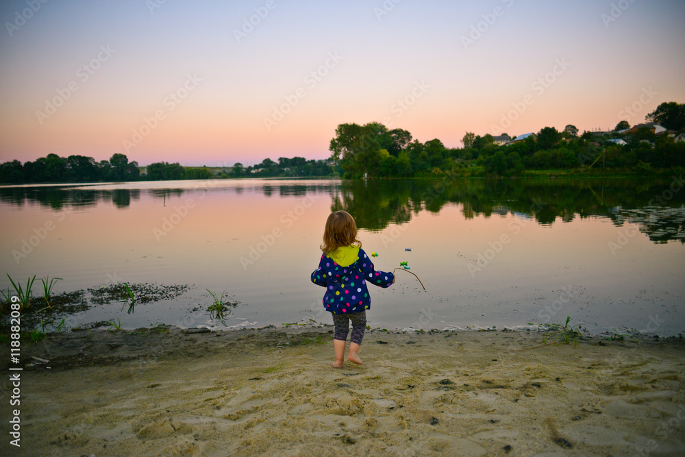 Small girl at the lake