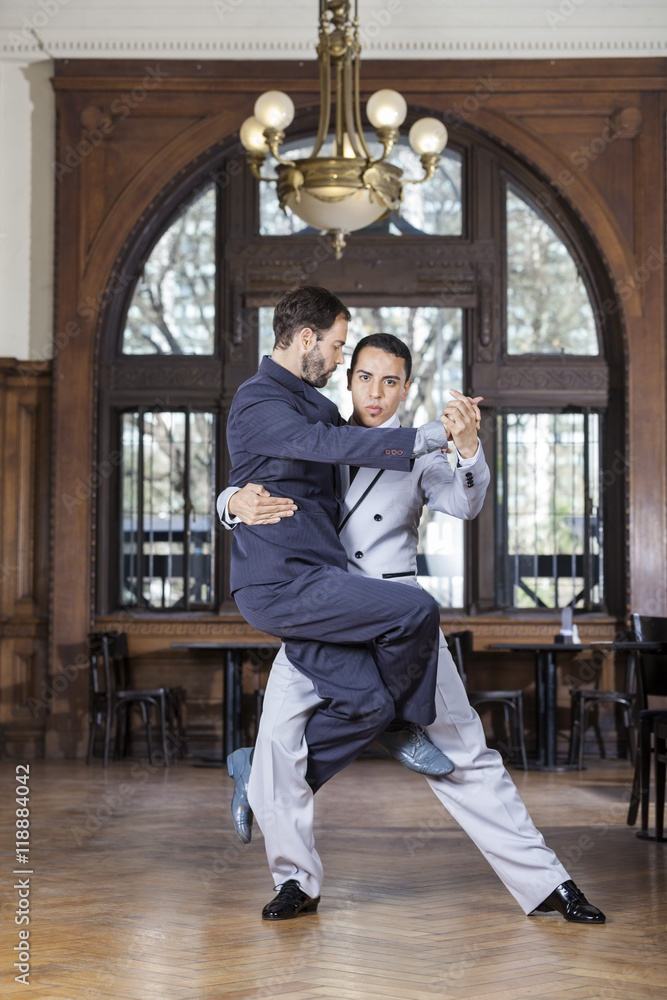 Confident Tango Dancer Lifting Male Partner