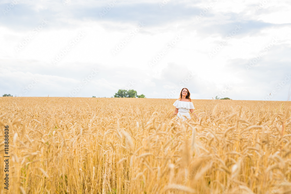 Autumn Girl enjoying nature on the field. Free Happy Woman Autumn Girl enjoying nature on the field. Free Happy Woman