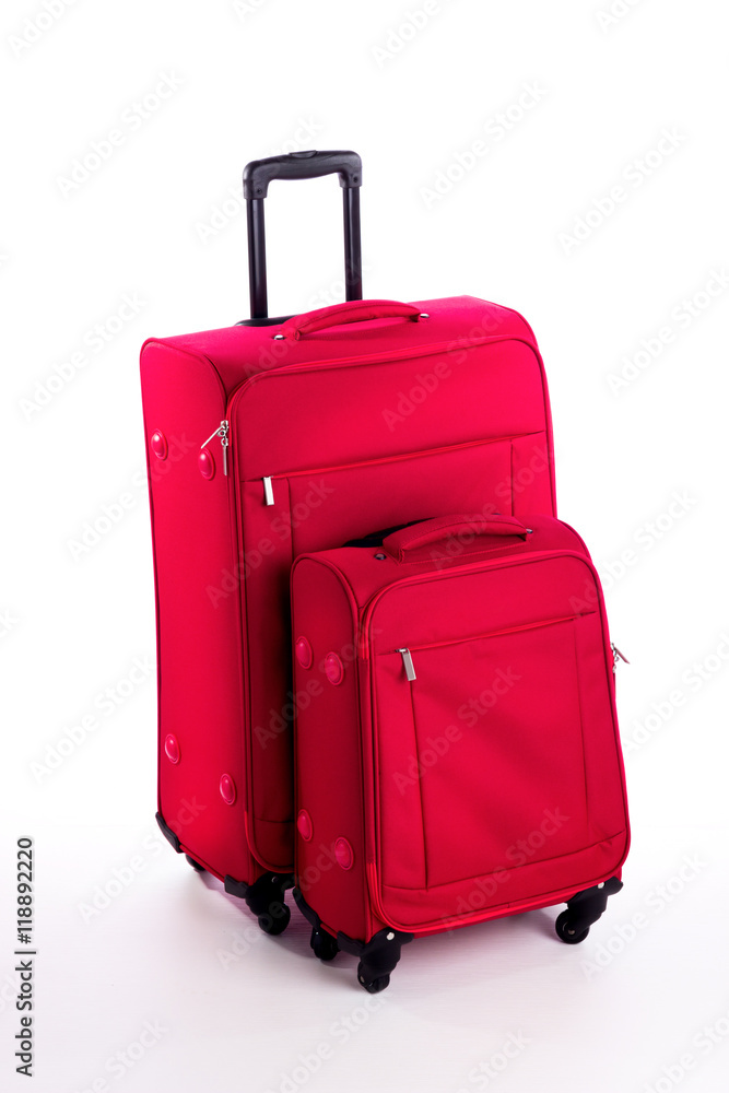 Red travel suitcase isolated on white Red travel suitcase isolated on white