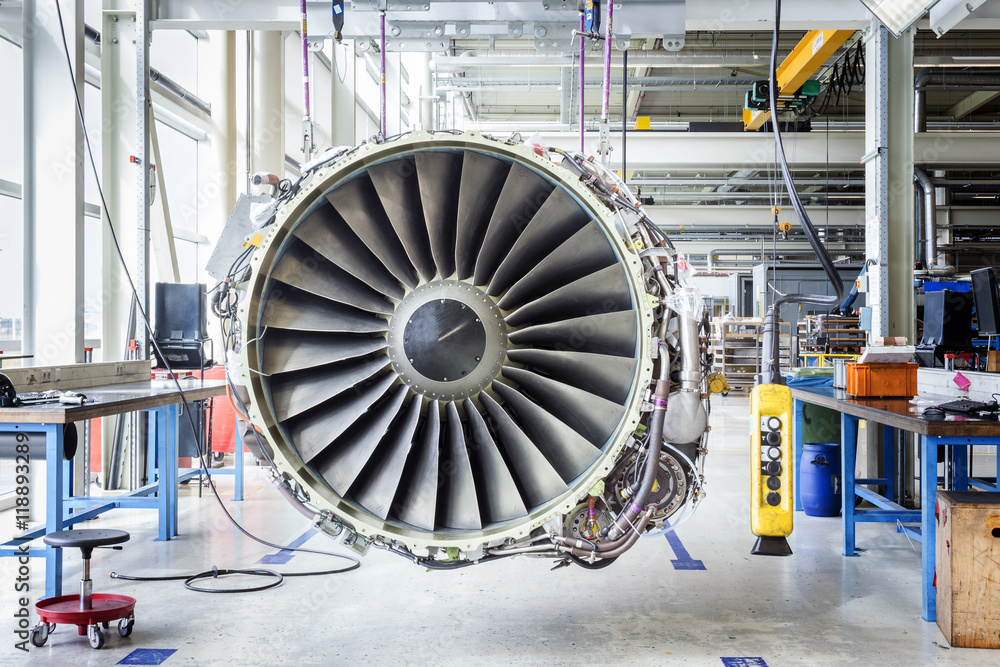 Fototapeta premium Big airplane engine during maintenance