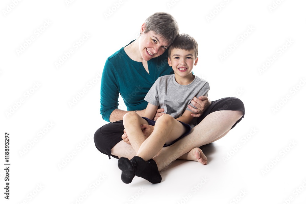 young little son embracing his mother young little son embracing his mother
