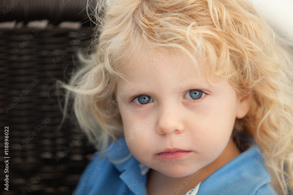 Beautiful boy three year old with long blond hair Beautiful boy three year old with long blond hair