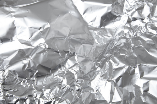 A full page of scrunched up silver aluminum foil texture photo