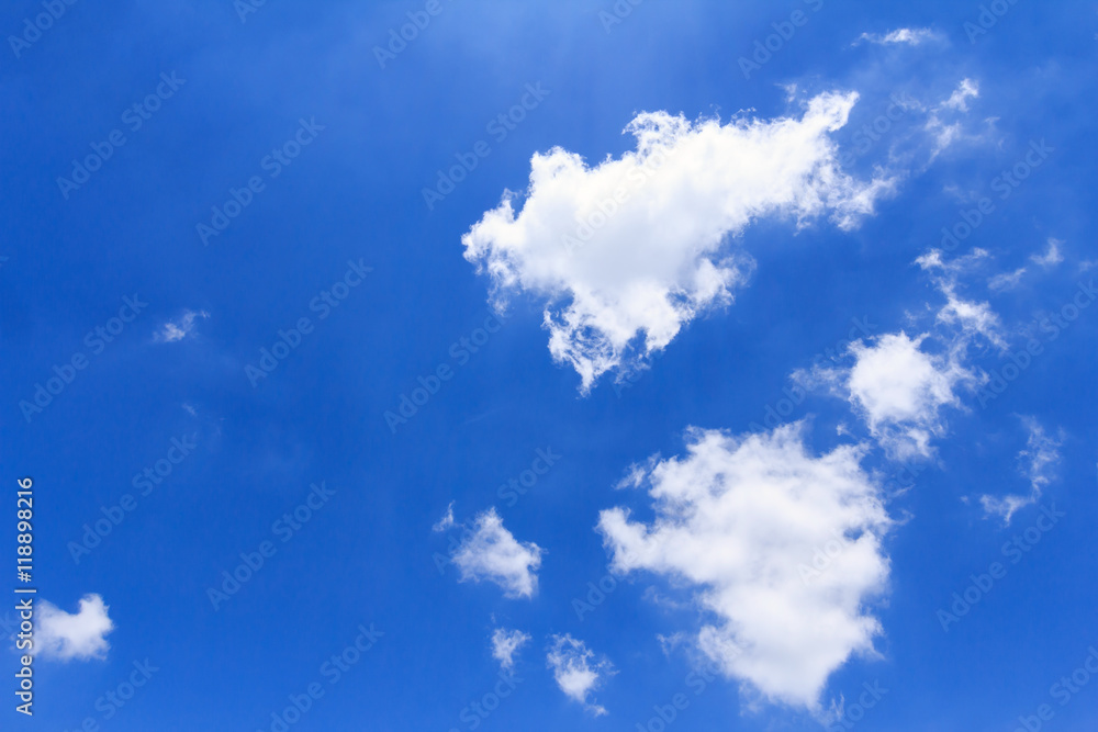 Obraz premium Blue sky background with white clouds. The vast blue sky and clouds sky on sunny day. White fluffy clouds in the blue sky.