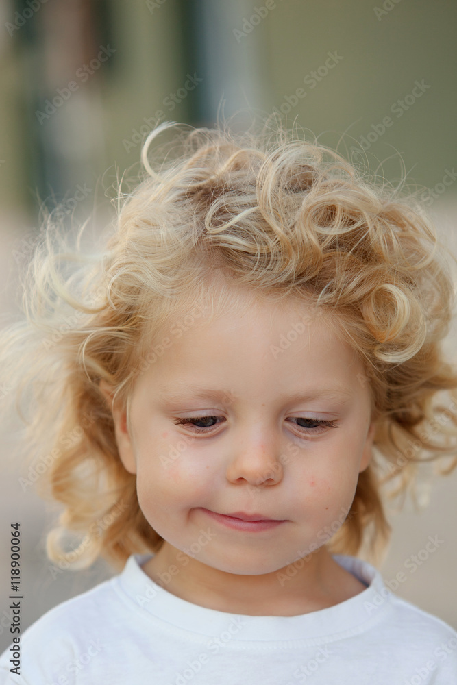 Beautiful boy three year old with long blond hair Beautiful boy three year old with long blond hair
