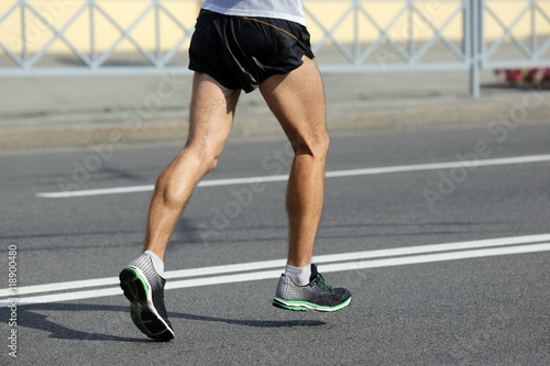 feet running athlete at the distance of a marathon