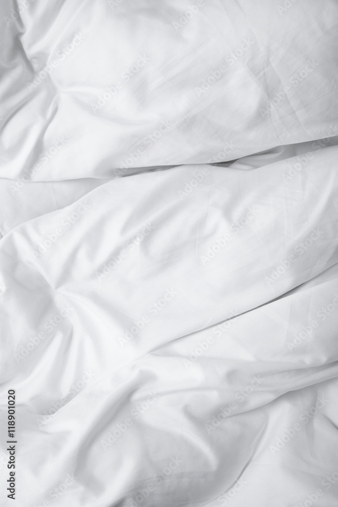 A full page of white creased duvet texture