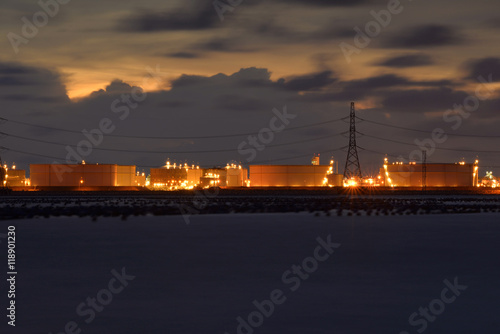 oil tanks in a refinery base and beautiful sunset .                © phonix_a