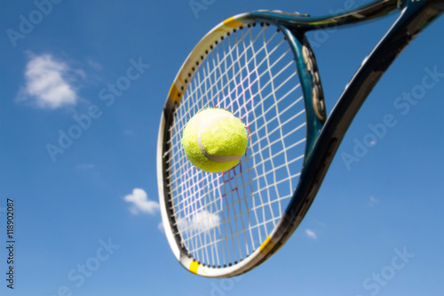 Tennis player hit shot tennis ball photo