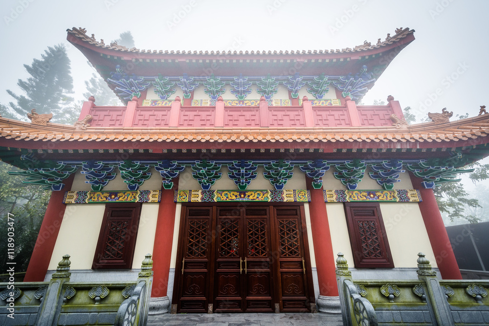 Historic building in fog, at Ngong Ping, Lantau Island, Hong Kon