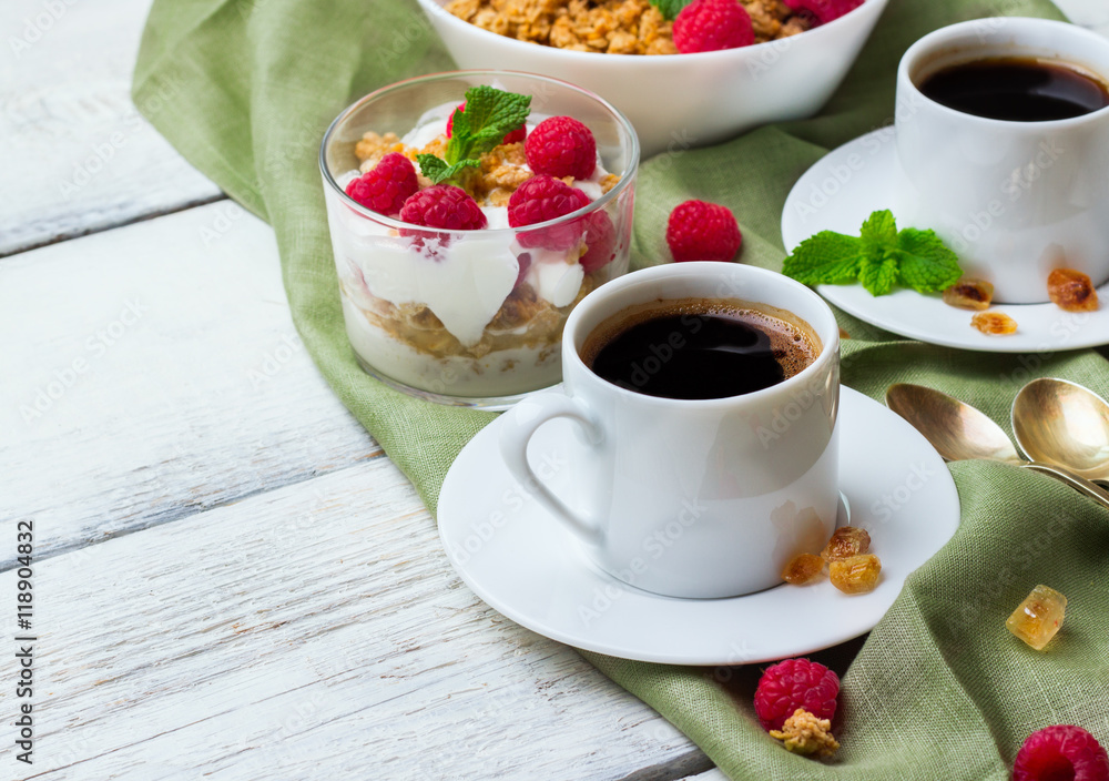 Breakfast concept. Coffee muesli granola berries homemade yogurt Breakfast concept. Coffee muesli granola berries homemade yogurt