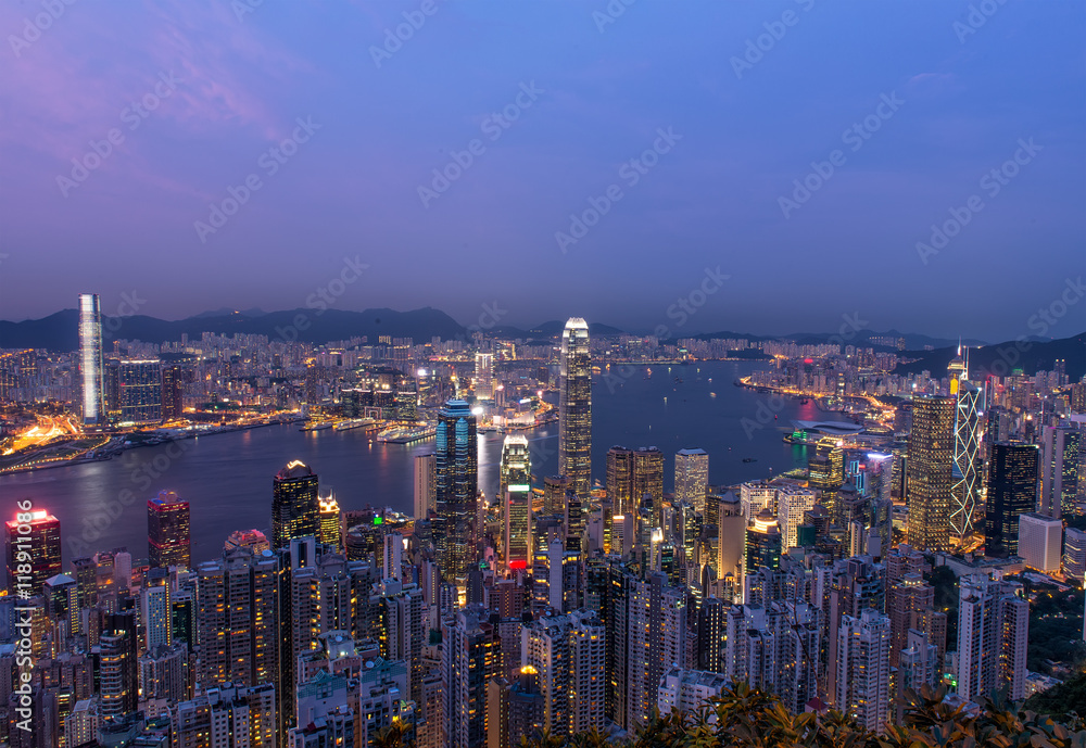 Obraz premium Hong Kong city skyline panorama at night with Victoria Harbor an