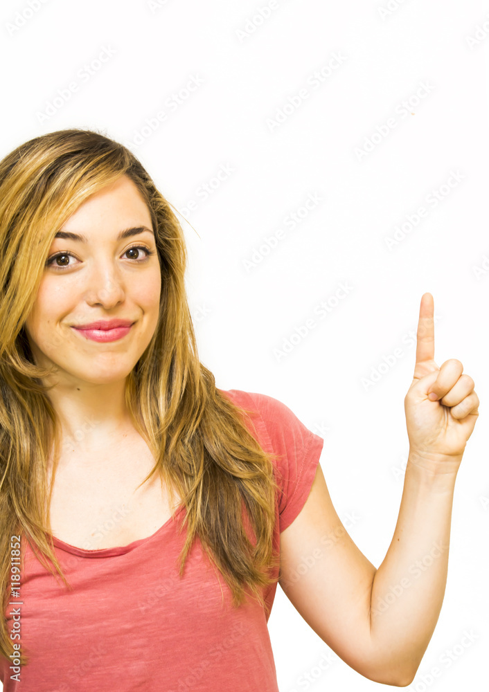 Portrait of a beautiful woman pointing up with her finger Portrait of a beautiful woman pointing up with her finger