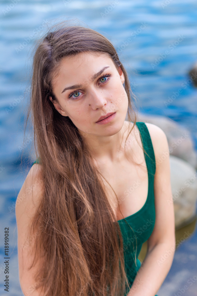 beautiful sad girl with green eyes