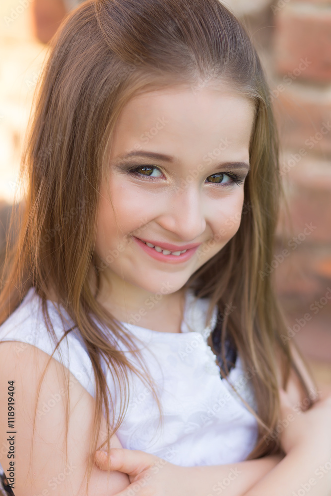 fashion photo of a beautiful girl on a background of brick ruin fashion photo of a beautiful girl on a background of brick ruin