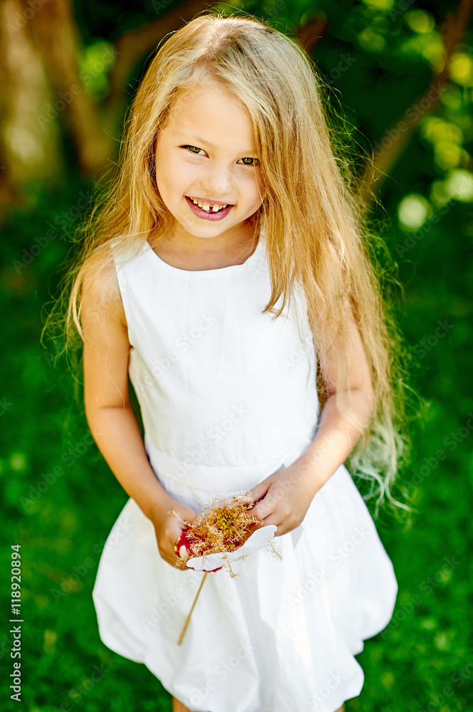 Sweet little girl in summer park Sweet little girl in summer park