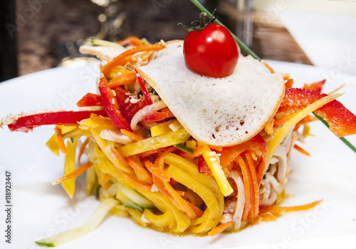 Bild auf Leinwand spaghetti with cheese and egg on a white plate in a restaurant