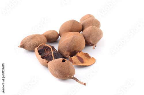 Tamarind isolated on white background. Sweet tamarind (Tamarind indica L.) photo