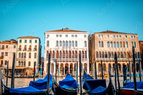 Venice cityscape view on Grand canal with colorful buildings and gondolas