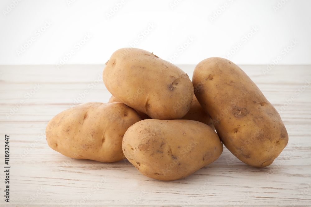 potato still life on wood background potato still life on wood background