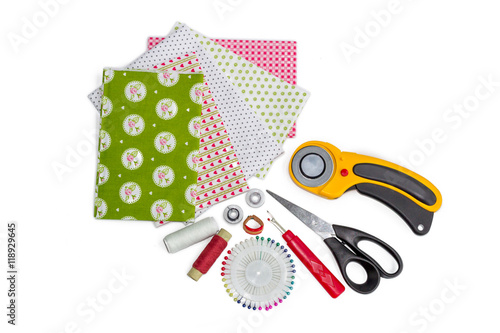 Composition of patchwork quilting instruments, items and fabrics