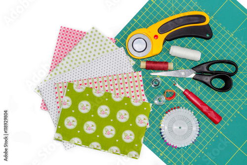 Hobby composition of instruments, items and fabrics for quilting