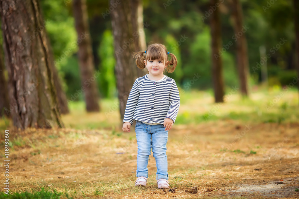 happy little child, baby girl playing in the autumn on the natur happy little child, baby girl playing in the autumn on the natur