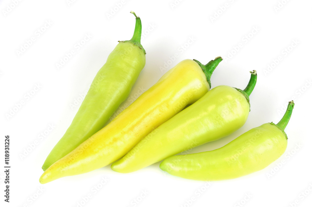 fresh farm picked yellow and green peppers isolated on white background