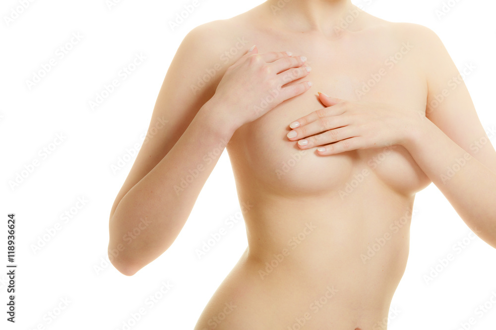 Woman examining her breasts for breast cancer Woman examining her breasts for breast cancer