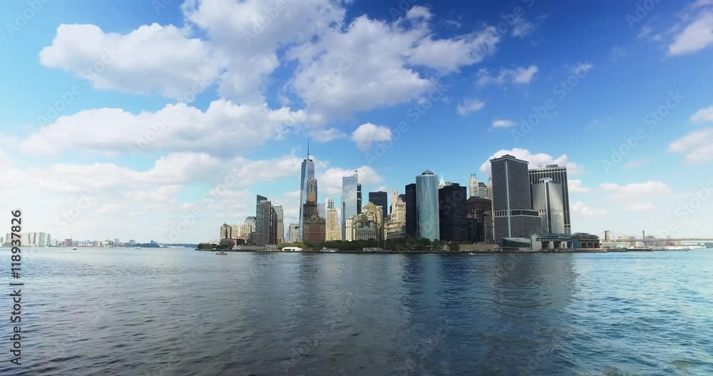 A daytime establishing shot of the lower Manhattan skyline as seen from New York harbor. A daytime establishing shot of the lower Manhattan skyline as seen from New York harbor.