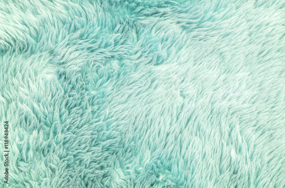 Closeup surface abstract fabric pattern at the light green fabric carpet at the floor of house texture background Closeup surface abstract fabric pattern at the light green fabric carpet at the floor of house texture background