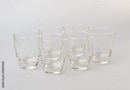 glass cup or empty glass mug on background.
