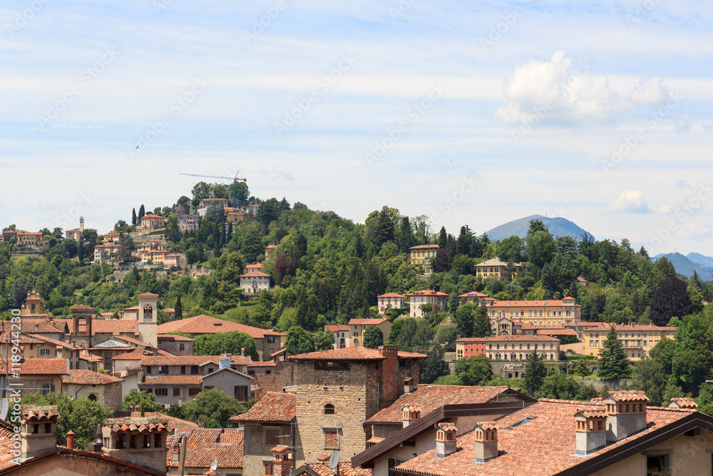 Panorama of upper city Citta Alta with hill San Vigilio in Bergamo, Italy