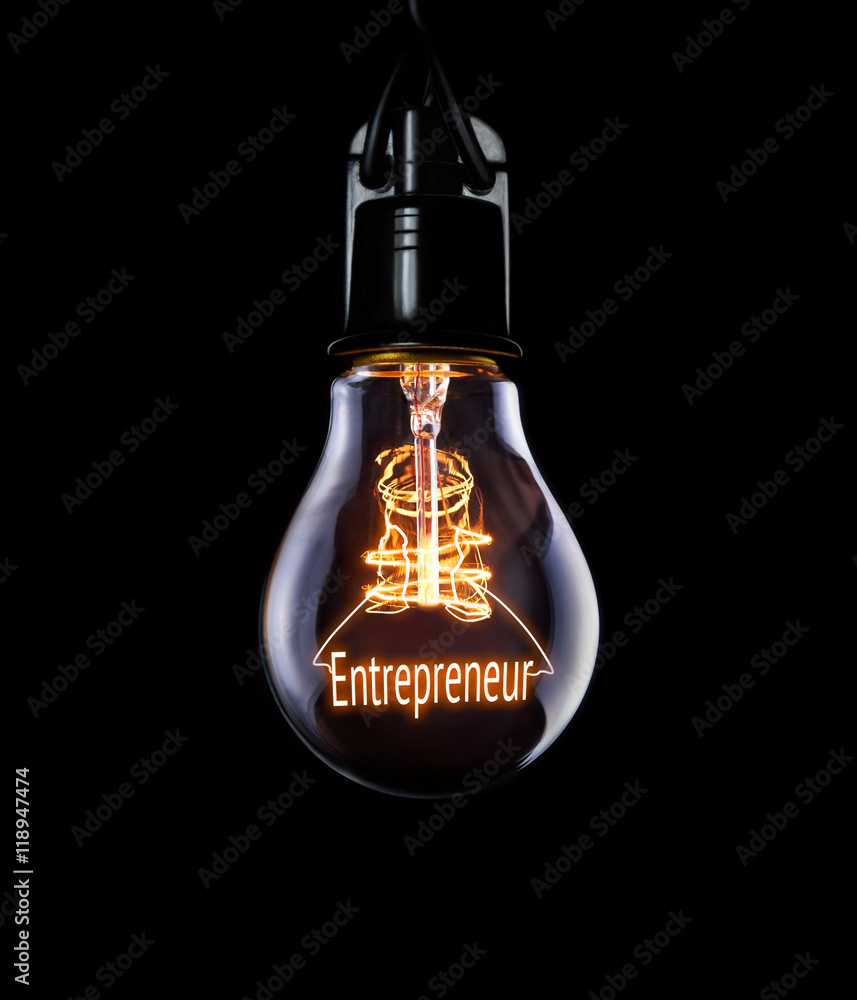 Hanging lightbulb with glowing Entrepreneur concept.