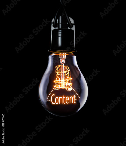 Hanging lightbulb with glowing Content concept.