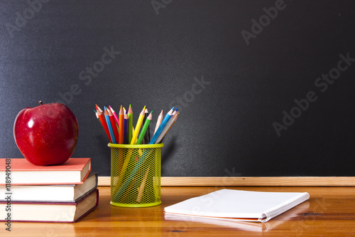 school supplies with chalkboard, back to school concept photo