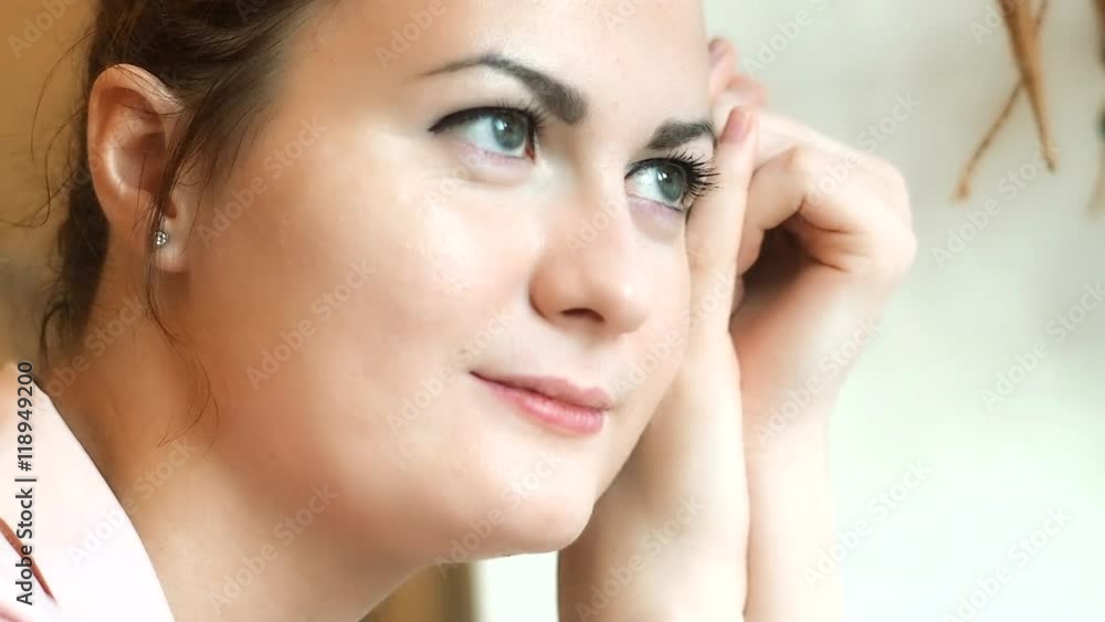 Portrait of Attractive Young Women With Green Eyes Looking at the Window. Day Dreaming. Close Up. Portrait of Attractive Young Women With Green Eyes Looking at the Window. Day Dreaming. Close Up.