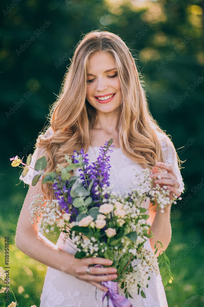 stylish boho bride holding rustic bouquet of amazing flowers stylish boho bride holding rustic bouquet of amazing flowers