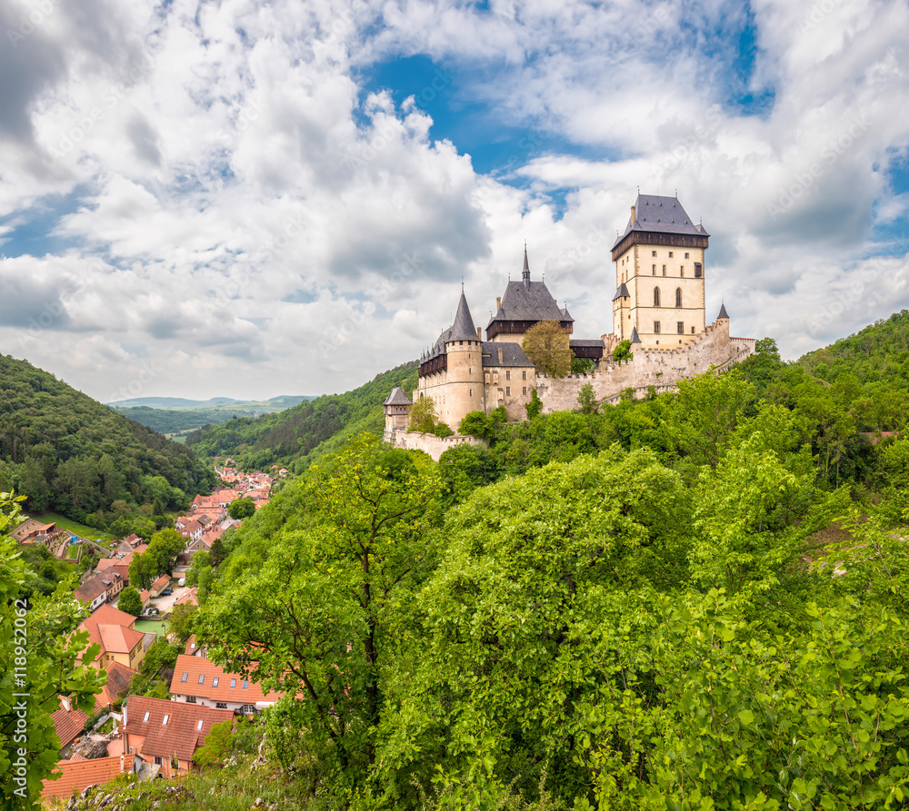 Karlstein, Czech Republic - May 26, 2016: Panoramic view of Karlstein Castle - large Gothic castle founded in 1348 by King Charles IV, Holy Roman Emperor and King of Bohemia. 