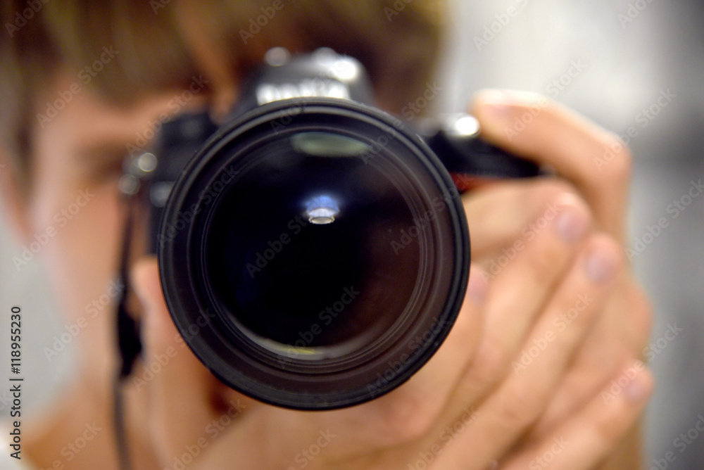 Self auto portrait camera lens in mirror photographer journalist